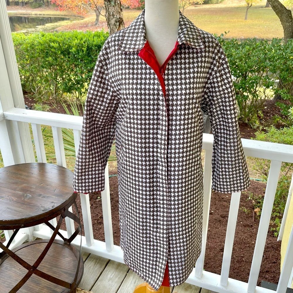 MycraPac Life Reversible Rain Coat. Houndstooth and Red. Size 0-P